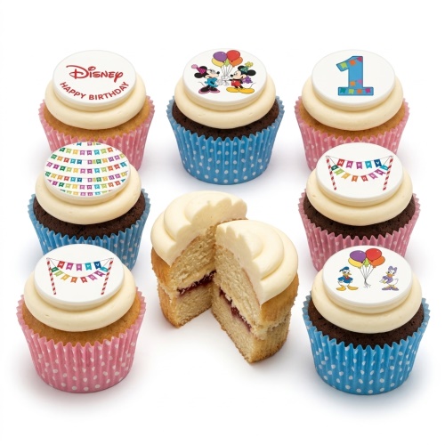 Assortment of Disney themed birthday cupcakes with Mickey, Minnie, Donald, Daisy, party banners, and a custom age '1' topper.