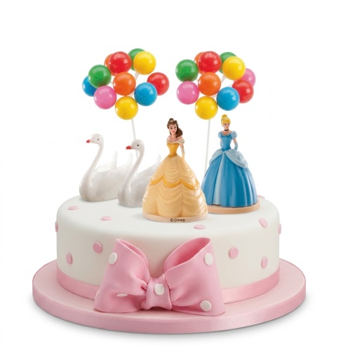 White round cake with Disney Princess figures, swans, colourful balloon toppers, and a pink bow.