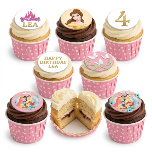 Selection of Disney Princess themed cupcakes with white and chocolate icing, pink polka dot cases, and edible toppers including Belle, a group of princesses, butterflies, a castle, and a custom age number.