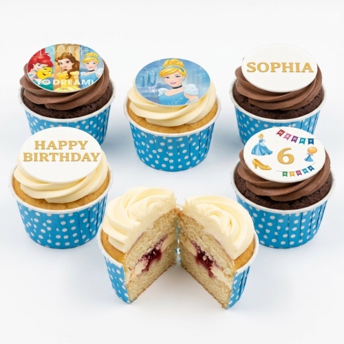 Assortment of Disney Princess cupcakes with character toppers, custom age, and personalised name options.