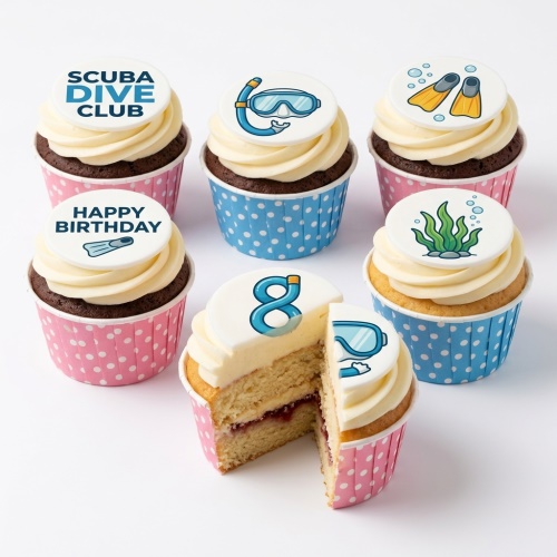 Scuba diving themed birthday cupcakes with edible toppers featuring a mask, flippers, seaweed, and a custom age '8'.