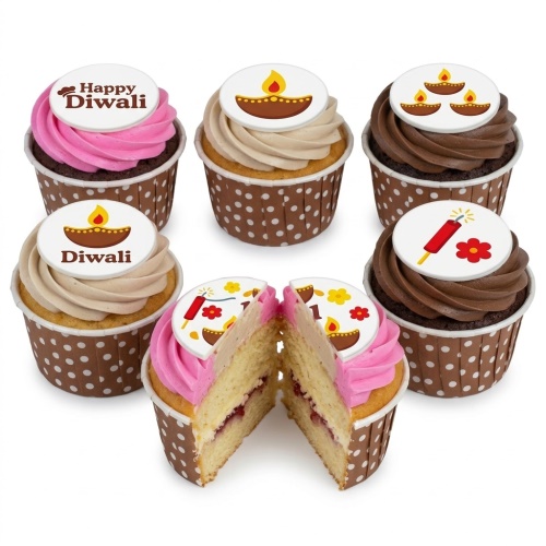 Diwali cupcakes with diya lamp and 'Happy Diwali' toppers, pink, beige, and chocolate frosting in polka dot cases.