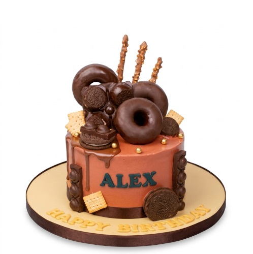 Round chocolate drip cake with chocolate donuts, biscuits, and pretzel sticks, with a custom name.