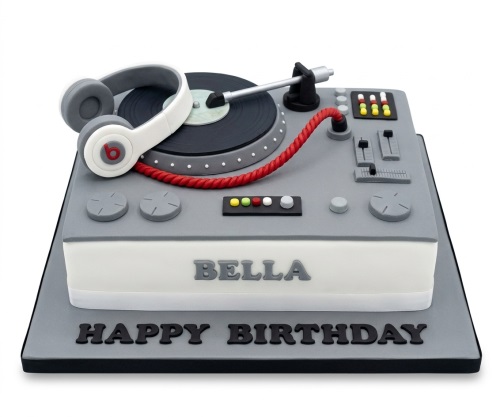 Grey and white DJ turntable birthday cake with headphones and a custom name message.
