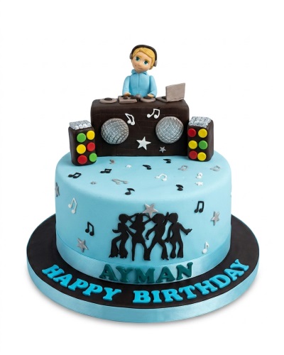 Two-tier light blue DJ party theme birthday cake with DJ figurine, disco balls, speakers, music notes, and dancing silhouettes.