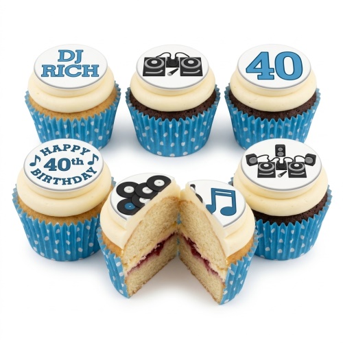 Six cupcakes with white frosting, blue polka dot cases, and music/DJ themed toppers including turntables, vinyl records, musical notes, and an age topper.