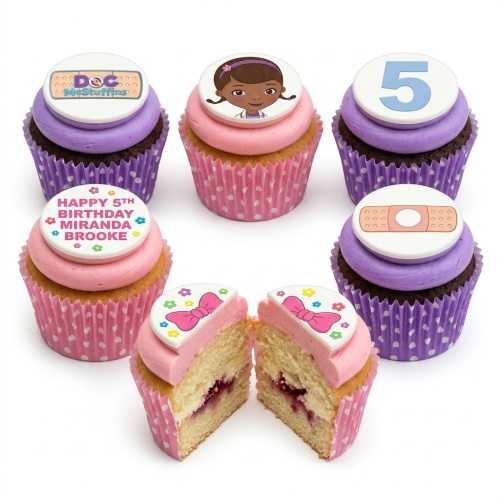 Doc McStuffins themed birthday cupcakes with character, logo, band-aid, bow, and custom age toppers.