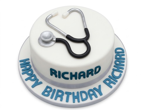 Round white birthday cake with a silver and black stethoscope decoration and custom message.