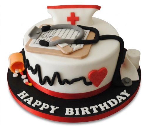 Round white nurse theme birthday cake with red and black accents, featuring a nurse's cap, stethoscope, clipboard, pills, and a heartbeat line.