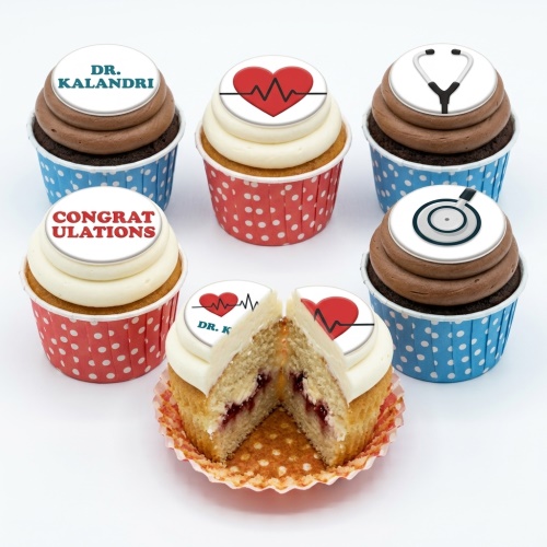 Cupcakes with medical themed toppers including stethoscopes, heartbeats, and custom messages.
