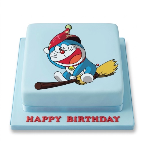 Light blue square birthday cake with a Doraemon character on a broomstick and a red 'Happy Birthday' message.