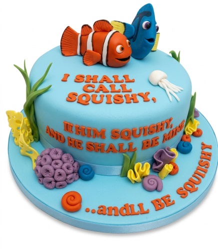 Round blue Finding Nemo birthday cake with Nemo, Dory, jellyfish, and coral decorations.