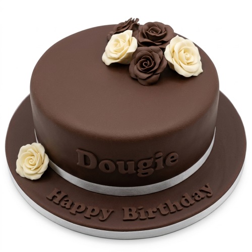 Round brown fondant birthday cake with cream and dark brown sugar roses, silver ribbon.