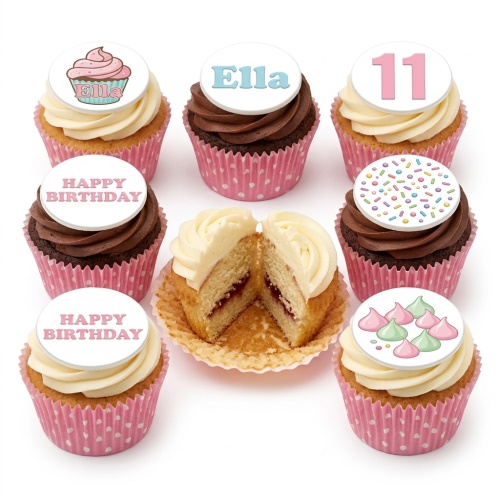 Assortment of vanilla and chocolate cupcakes in pink polka dot wrappers with customisable toppers including age, name, sprinkles, and meringue drops.
