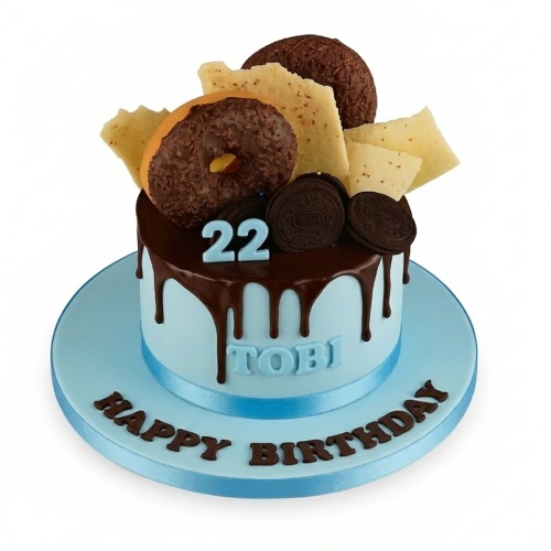 Light blue chocolate drip birthday cake with donut, Oreos, chocolate shards, and custom age topper.