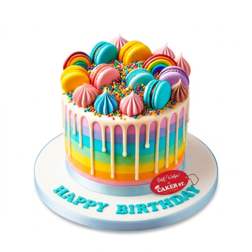 Round rainbow drip birthday cake with colourful macarons, meringues, and sprinkles.