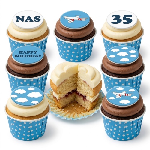 A selection of drone theme birthday cupcakes with blue polka dot wrappers, blue and white toppers, some with a drone, clouds, 'Happy Birthday', 'NAS', and '35'.
