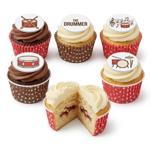 Assortment of cupcakes with chocolate and vanilla frosting, topped with edible drum and drummer themed discs.