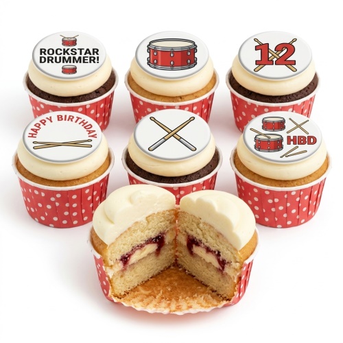 Cupcakes with white frosting and red polka dot cases, topped with edible drum and drumstick designs, including "Rockstar Drummer!" and "Happy Birthday" messages, and a custom age topper.
