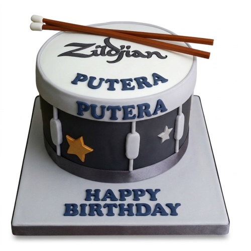 Drum-shaped birthday cake with Zildjian logo, drumsticks, and custom message on cake board.