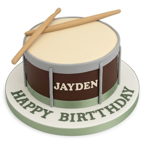 Round drum-shaped birthday cake with edible drumsticks and personalised name.