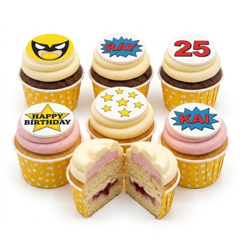 Assortment of superhero and comic book themed cupcakes with custom age, names, and happy birthday toppers.