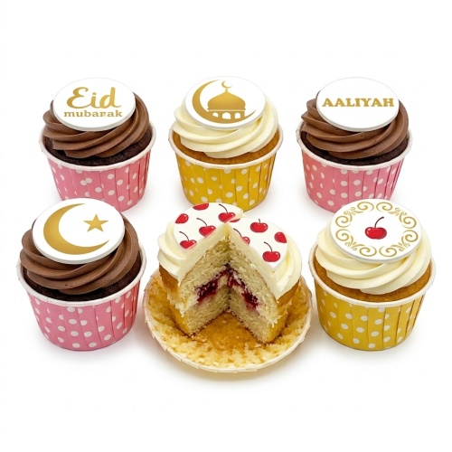 A selection of Eid Mubarak cupcakes with chocolate and vanilla frosting, featuring gold Islamic symbols and cherry designs.