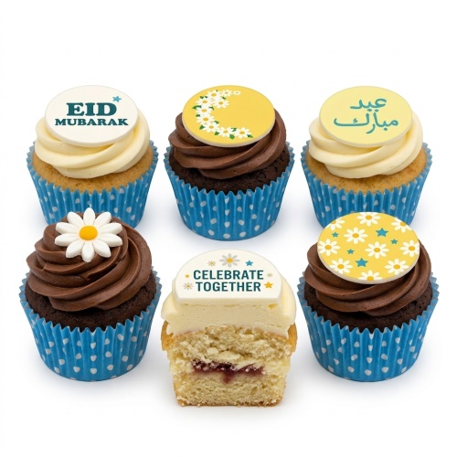 Eid Mubarak celebration cupcakes with white and yellow floral designs and blue cases.
