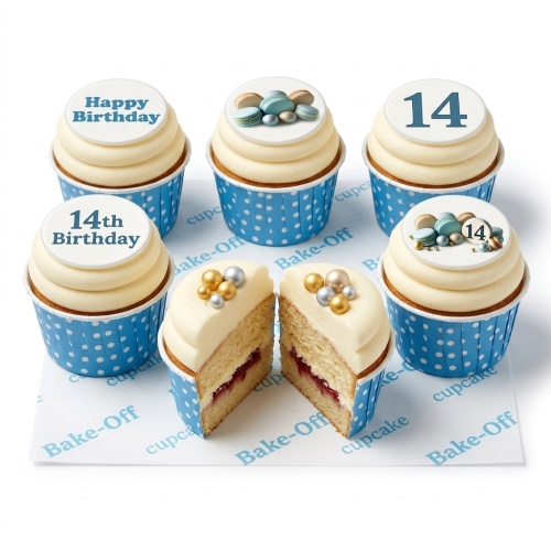 Six custom age birthday cupcakes with white frosting, blue polka dot cases, macarons, and gold and silver pearls.