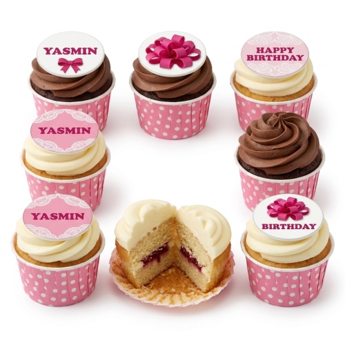 Pink polka dot cupcakes with chocolate and vanilla frosting, topped with pink bows and lace-patterned birthday messages.