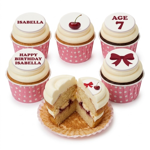 Cupcakes with white frosting, pink polka dot cases, red cherries, bows, and custom age/name toppers.