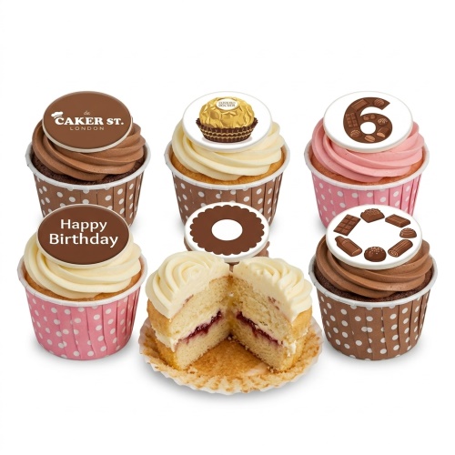Chocolate and vanilla cupcakes with chocolate-themed decorations and custom age toppers.