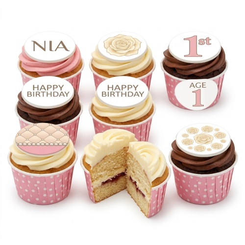 Close-up of elegant birthday cupcakes with rose and pearl toppers, in pink polka dot wrappers.