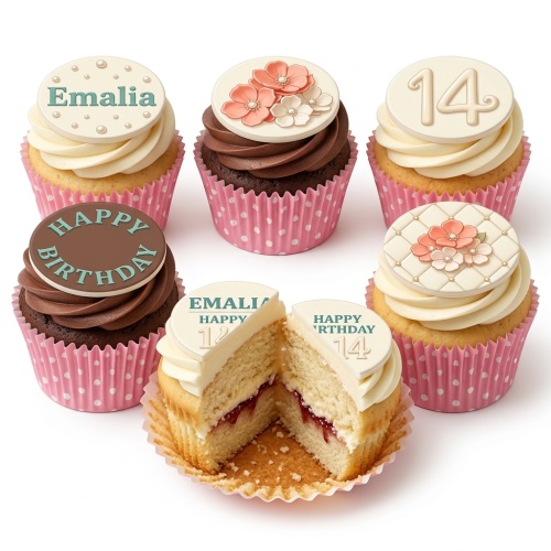 A selection of vanilla and chocolate cupcakes with white and brown frosting, decorated with floral, pearl, custom name, custom age, and 'Happy Birthday' toppers in pink polka dot wrappers.