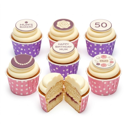 Elegant cupcakes with cream frosting, featuring floral, pearl, and custom age toppers in pink and purple wrappers.