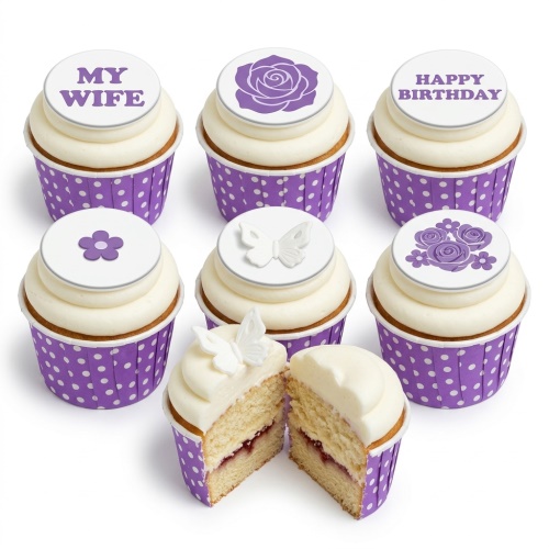 White and purple cupcakes with floral and butterfly designs, some with 'Happy Birthday' message, in polka dot wrappers.