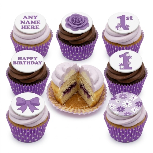 Purple and white cupcakes with floral, bow, and custom message toppers.