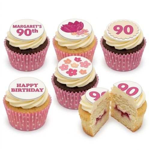 Assorted floral birthday cupcakes with custom age and 'Happy Birthday' toppers