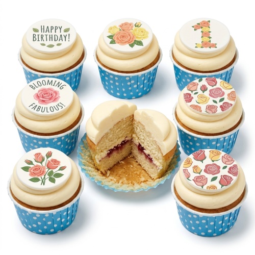 Set of floral rose birthday cupcakes with 'Happy Birthday!' and 'Blooming Fabulous!' toppers, in blue polka dot cases.