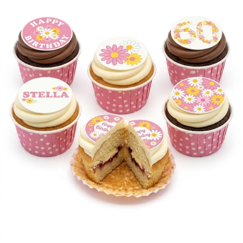 Birthday cupcakes with pink and yellow daisy toppers, some with 'Happy Birthday' and a custom name, one with a custom age.