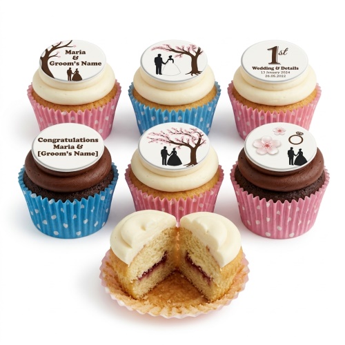 Assortment of anniversary cupcakes with couple, cherry blossom, and custom message toppers.