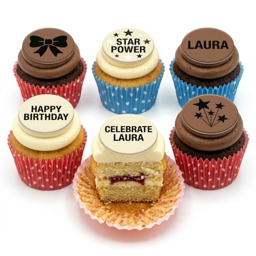 Cupcakes with chocolate and vanilla frosting, custom edible toppers featuring bows, stars, and 'Happy Birthday'.