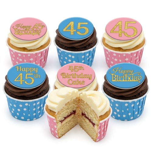 Assortment of vanilla and chocolate custom age birthday cupcakes with pink and blue polka dot cases and edible age toppers.