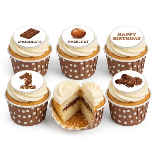 Set of chocolate and hazelnut themed cupcakes with white frosting and edible toppers, including a 'Happy Birthday' message and a number '1' made of chocolate and hazelnuts.