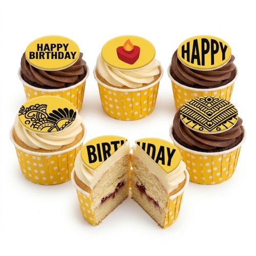 A set of six cupcakes with yellow polka dot cases, some with chocolate and some with vanilla frosting. Toppers include 'Happy Birthday' text, a red candle, and intricate black henna-style patterns. One cupcake is cut in half, showing vanilla sponge and jam filling.