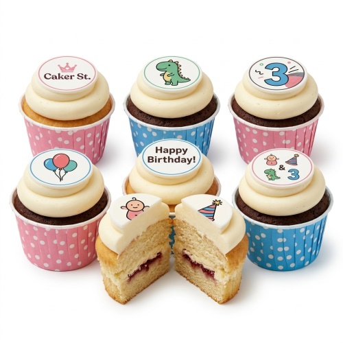 Assortment of kids birthday cupcakes with dinosaur, balloon, baby, and party hat toppers on white and chocolate cupcakes.