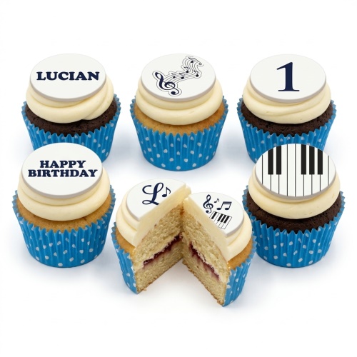 Six cupcakes with cream frosting and blue polka dot cases, featuring white edible toppers with musical notes, a treble clef, a piano keyboard, and example custom text.