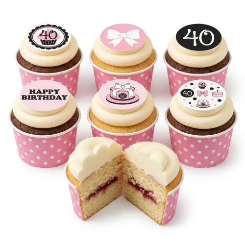 Pink and black birthday cupcakes with bow and custom age toppers.