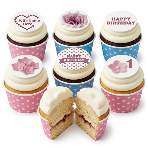 Assorted cupcakes with white frosting, floral toppers, and customisable birthday messages in pink and blue polka dot cases.
