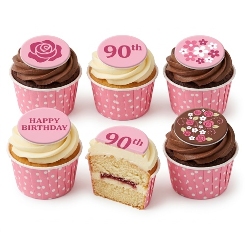 Assortment of pink and chocolate floral birthday cupcakes with custom age and Happy Birthday toppers.